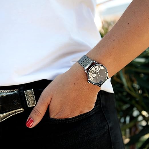 28 Clever and Thoughtful Gift Ideas for Her Under $50 25 Nine West Women's Gunmetal and Silver-Tone Mesh Bracelet Watch, NW/2429FLGY