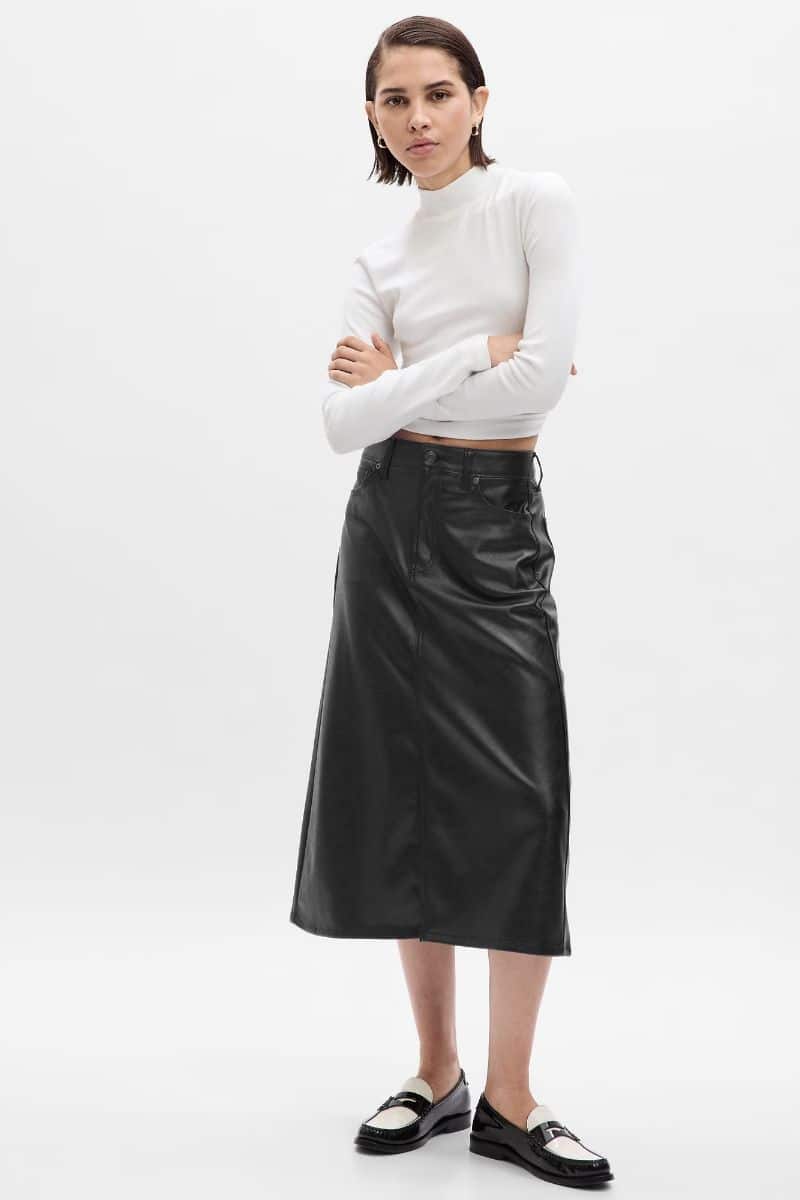 Leather Clothes are Trending: Here's How to Wear Them 4 Model wears leather skirt by Gap with crop top.