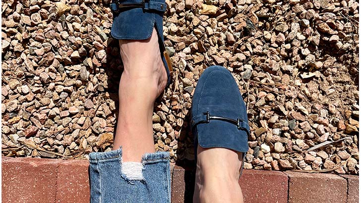 Mules for Fall: How to Wear Them + Styles to Shop 77 Overhead view of woman's legs wearing mules for fall.