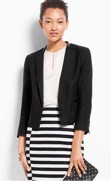 Work outfit consisting of blazer, white top and striped pencil skirt.