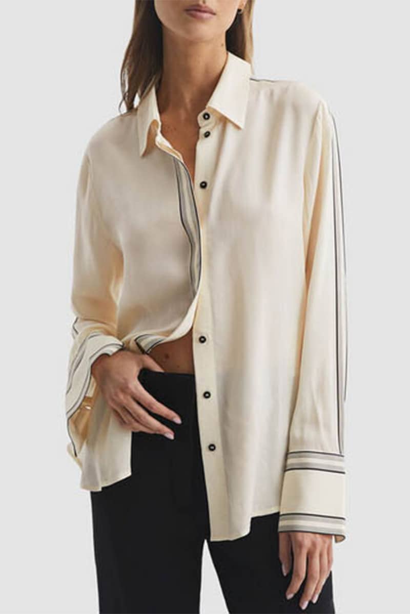 What to Buy at the Fenwick Designer Sale 4 Cream colored blouse with stripe detail, on sale at the Fenwick designer sale.