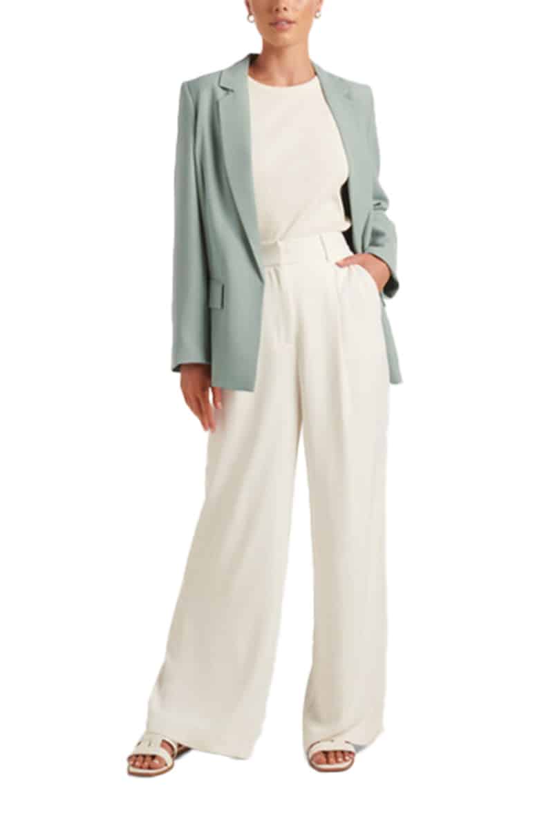 What to Buy at the Fenwick Designer Sale 6 Sage green blazer paired with cream top and wide-legged pants.
