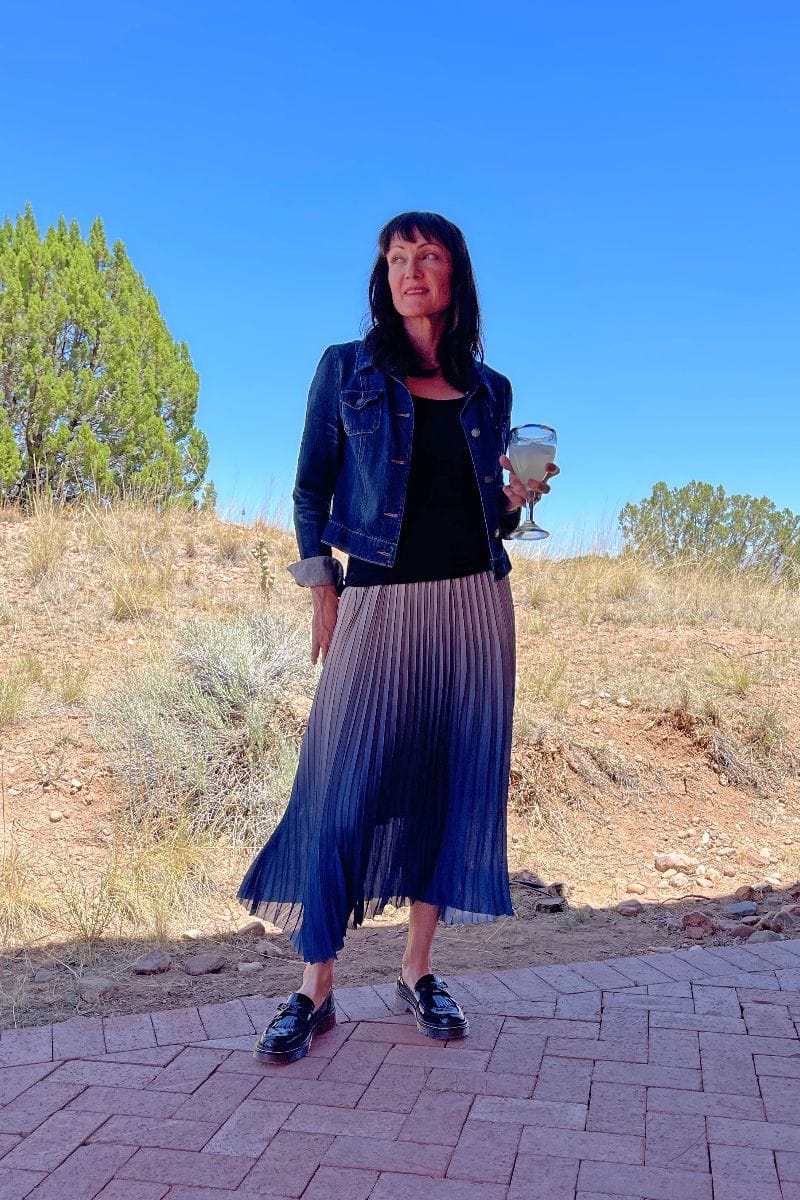 How to Wear Chunky Loafers After 40 3 Catherine Brock wearing chunky loafers with pleated maxi skirt.