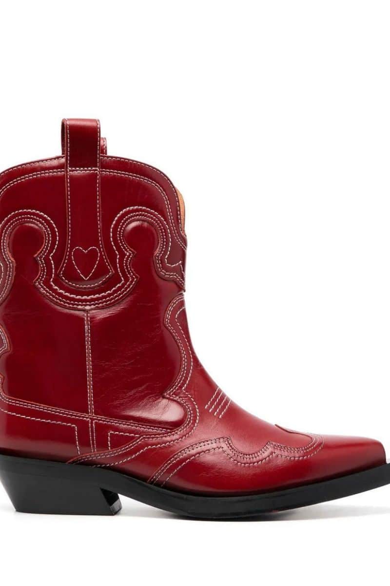 Farfetch Sale: 10 Designer Pieces to Shop Now for Less 4 Red Ganni cowboy boot discounted in Farfetch sale.