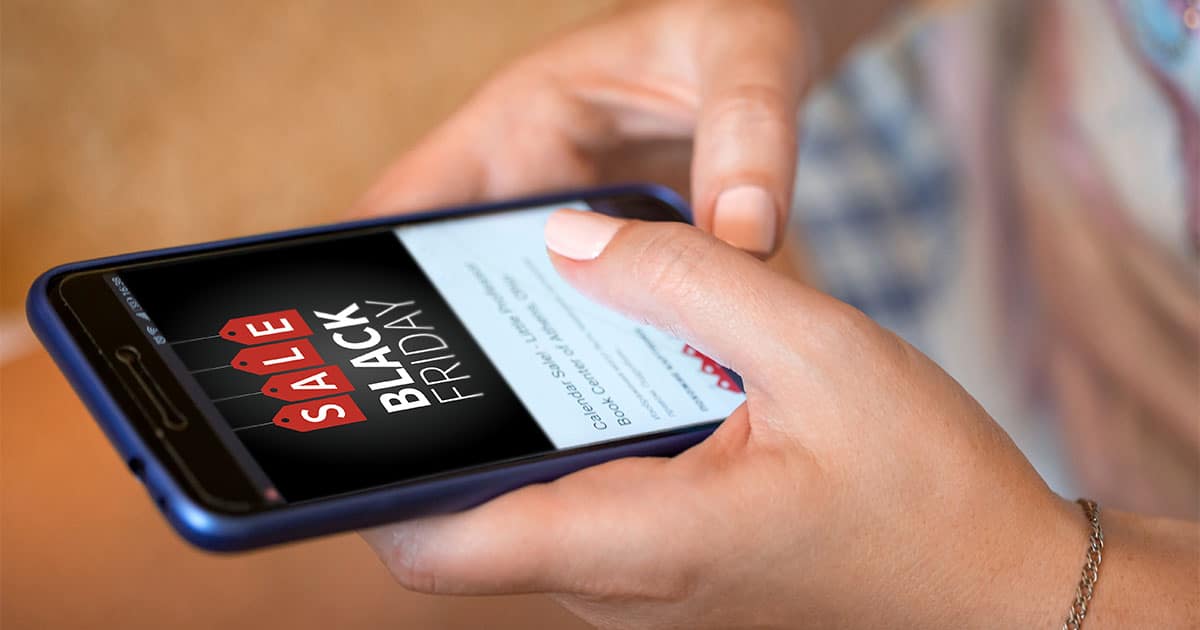 These 27 Amazon Black Friday Deals Are Trending 65 Woman uses phone to search for Amazon Black Friday deals.
