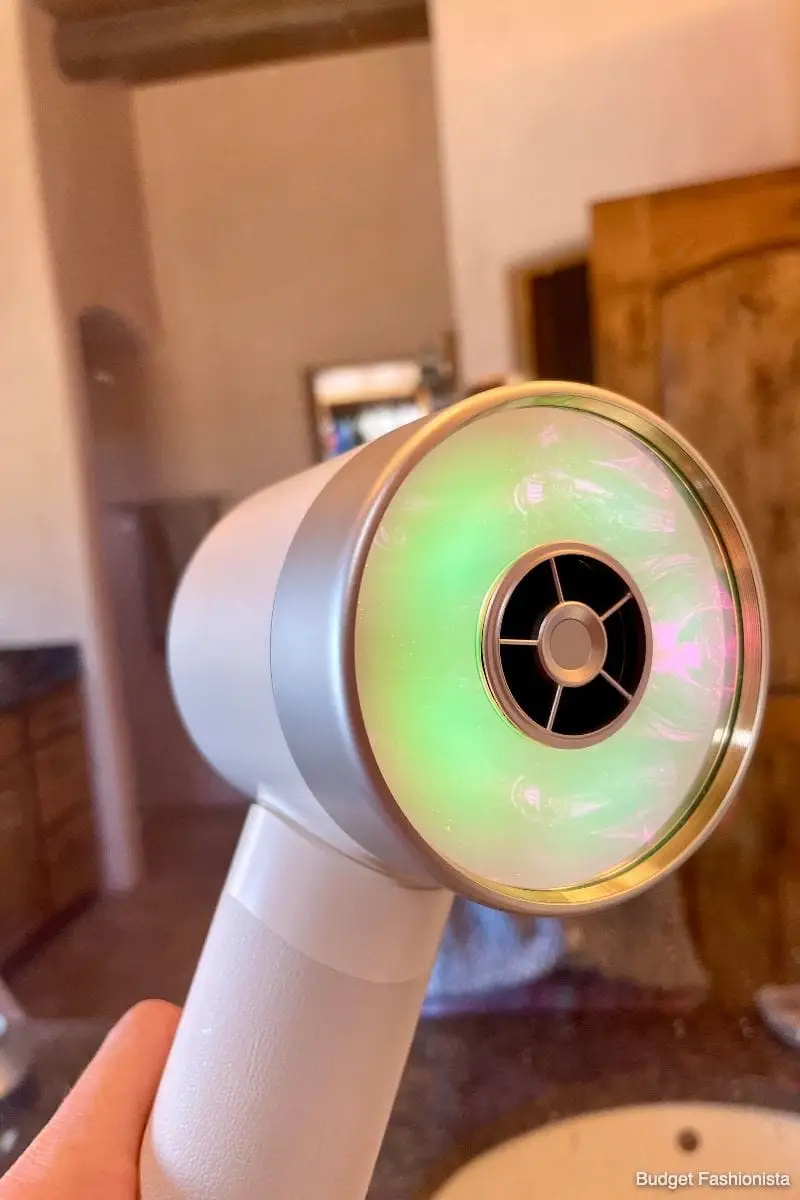 Zuvi Halo Hair Dryer: Read This Before You Buy 2 Close-up of Zuvi Halo hair dryer turned on to show light.