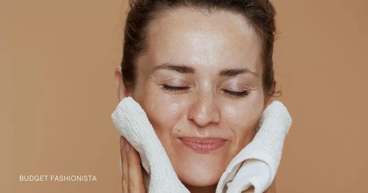 How to Shop for Clean Beauty Products Online 31 Woman holding washcloths against her face.