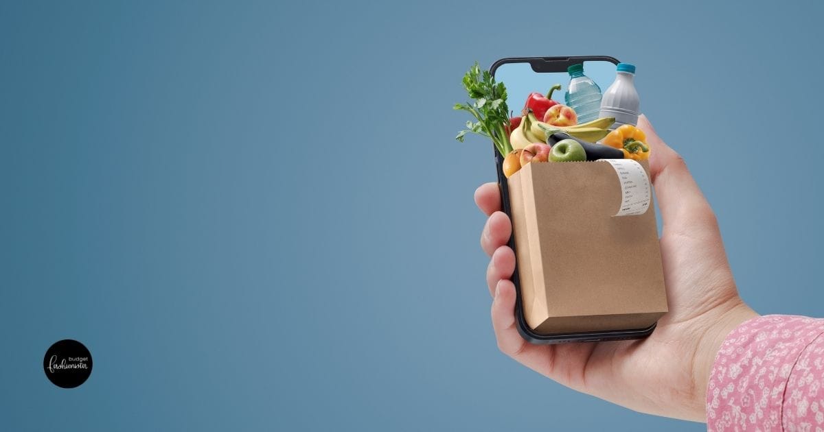 These 4 Walmart+ Perks Are Worth $800 Annually 14 Online shopping concept -- mobile phone with a small bag of groceries.